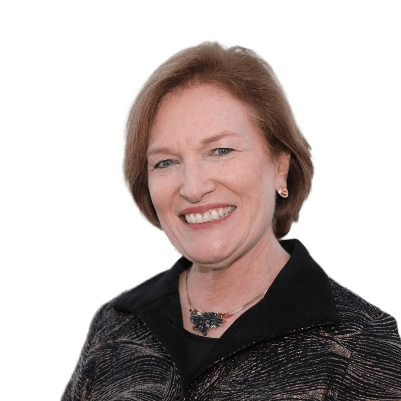 Smiling woman with short hair, black top.